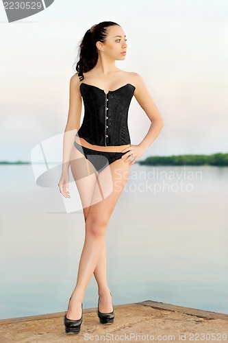 Image of Brunette wearing black panties 