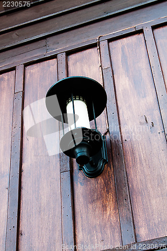 Image of Vintage wood wall with walkway retro lamp