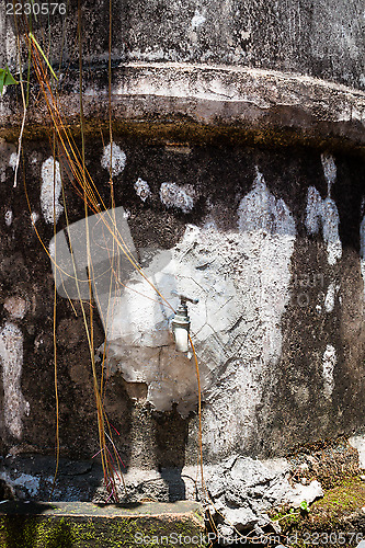 Image of Water concrete tank with water seeping out