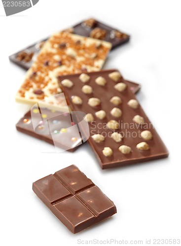Image of Various chocolate bars on white background