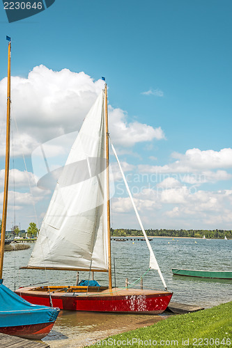 Image of Red sport sailboat