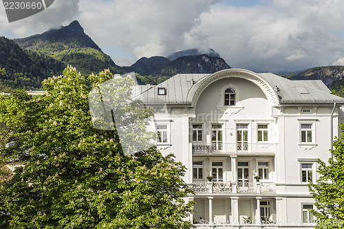 Image of Mansion and alps in sun