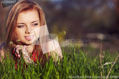 Image of  Girl on the spring grass