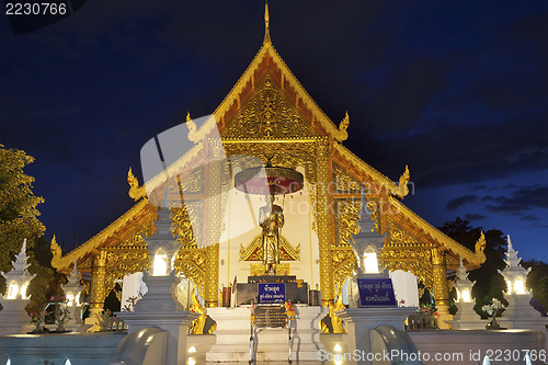 Image of Wat Phra Singh temple at night in Chiang Mai, Thailand.