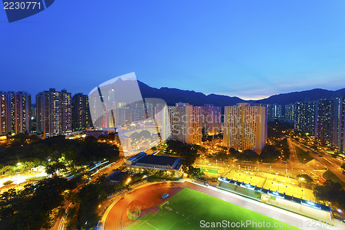 Image of Hong Kong sunset with crowded buildings background