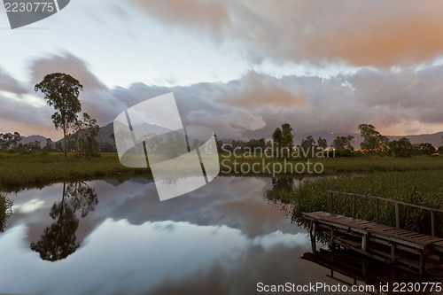 Image of Sunrise at pond in wetland of Hong Kong