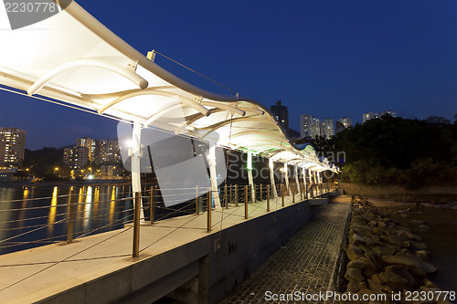 Image of Footbridge along the coast at night
