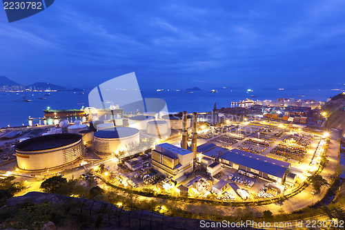 Image of Industrial oil tanks at night 