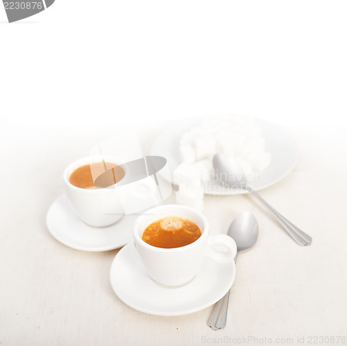 Image of Italian espresso coffee and sugar cubes