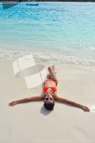 Image of beautiful gril on beach have fun