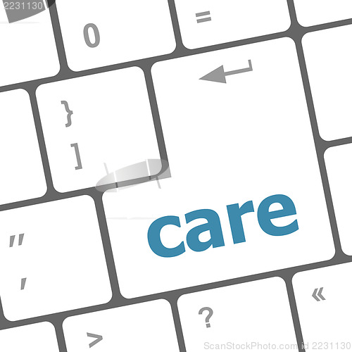 Image of care word on computer pc keyboard key