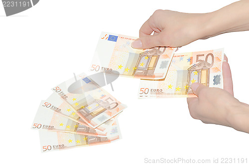 Image of Woman's hands counting euro banknotes