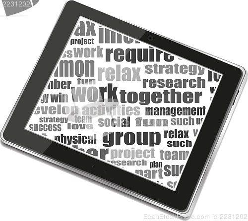 Image of Business and financial words and tablet pc with empty screen