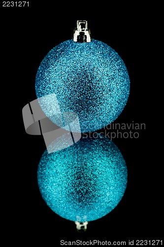 Image of christmas decoration in blue on black