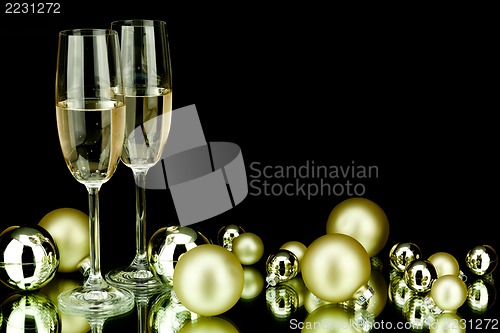 Image of christmas decoration and champagne on black