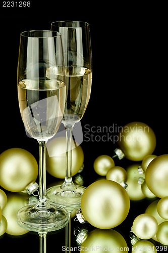 Image of christmas decoration and champagne on black