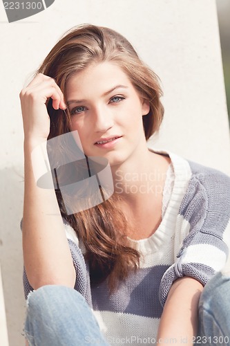 Image of attractive woman barefoot in summertime outdoor