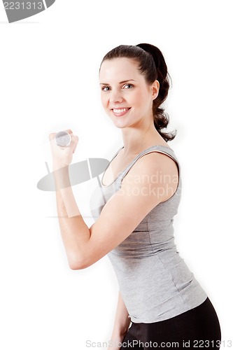 Image of attractive young woman doing fitness dumbbell