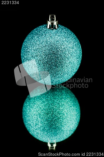 Image of christmas decoration in blue on black