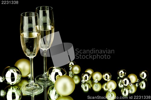 Image of christmas decoration and champagne on black