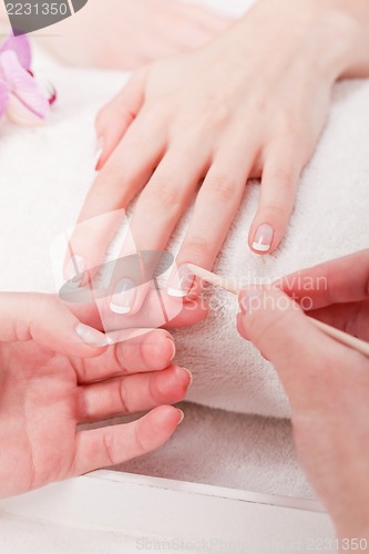 Image of manicure making in beauty spa salon 
