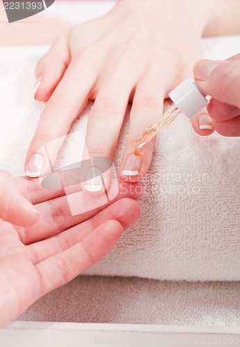 Image of manicure making in beauty spa salon 