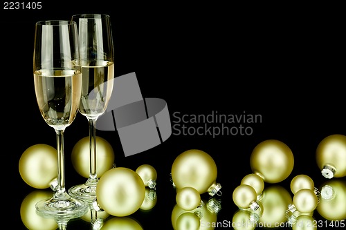 Image of christmas decoration and champagne on black