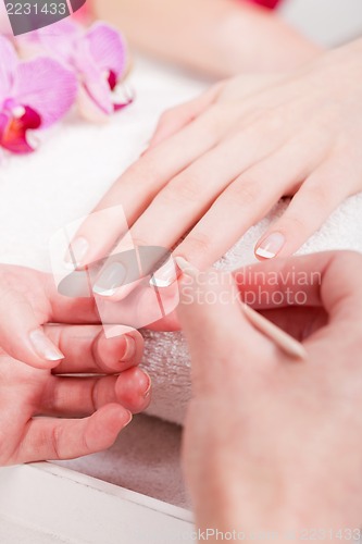 Image of manicure making in beauty spa salon 