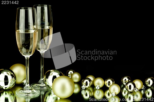 Image of christmas decoration and champagne on black