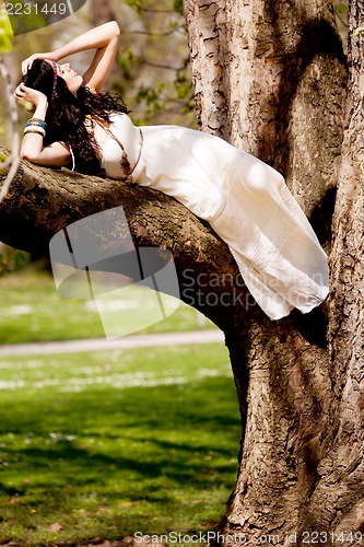 Image of beautiful brunette woman in summertime 