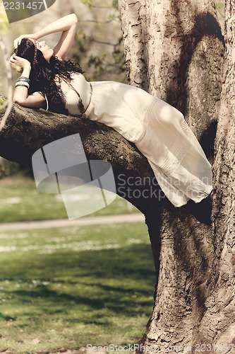 Image of beautiful brunette woman in summertime 