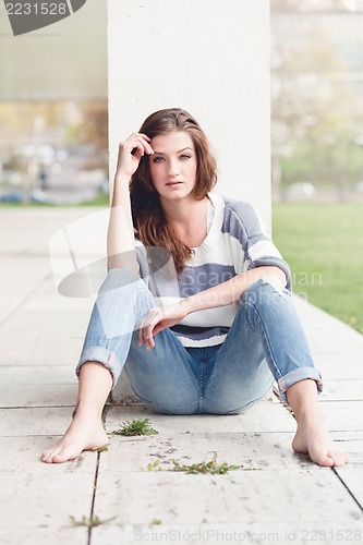 Image of attractive woman barefoot in summertime outdoor