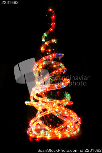 Image of christmas tree in the dark night 
