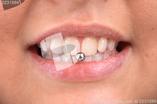 Image of sweet lips with piercing 