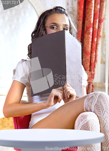 Image of girl in hotel room