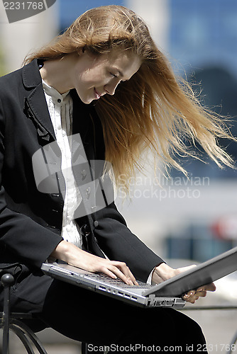 Image of young undergraduate with laptop