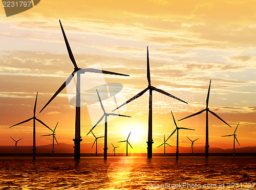 Image of wind turbine on sunset