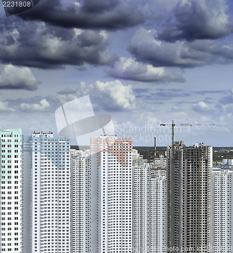 Image of Clouds over building