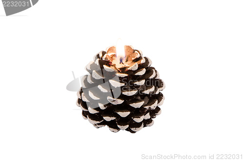Image of decorative cone shape candle burn flame isolated 