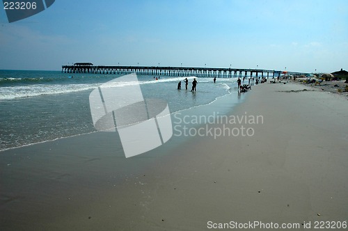 Image of beach with pier