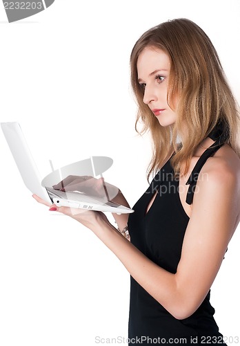 Image of Attractive blonde girl with laptop