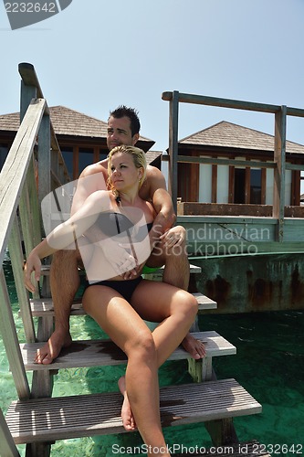 Image of happy young  couple at summer vacation have fun and relax at bea