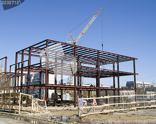 Image of Building under construction and building crane