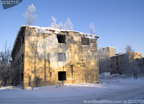 Image of Abandoned and broken-down house in winter