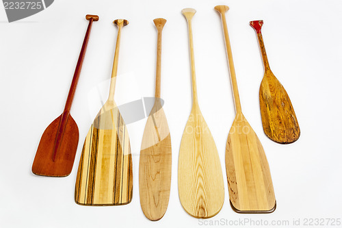 Image of wooden canoe paddles