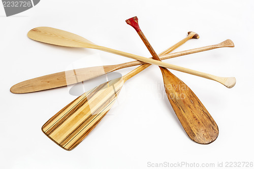 Image of wooden canoe paddles