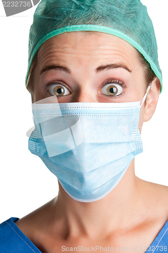 Image of Surprised Female Surgeon with face mask