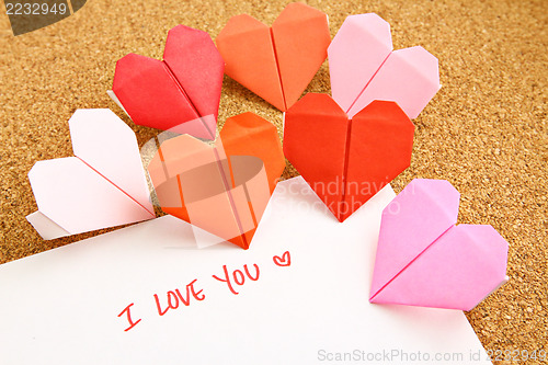 Image of Origami paper hearts with message 