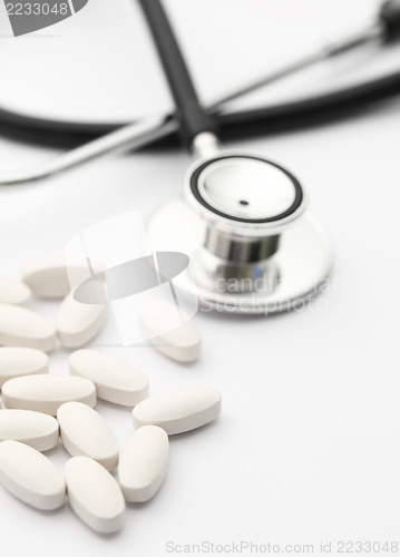 Image of Medical earphone with pills 