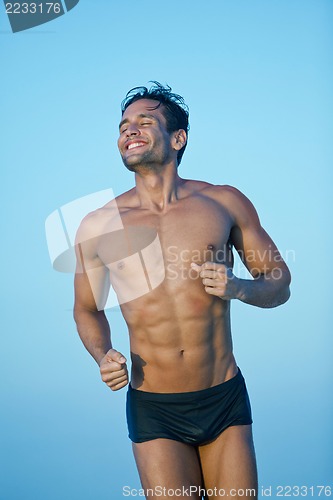 Image of Close-up of a man smiling with his eyes closed